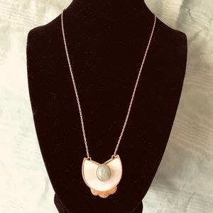 “1928” Necklace. Gold tone shell & simulated jade